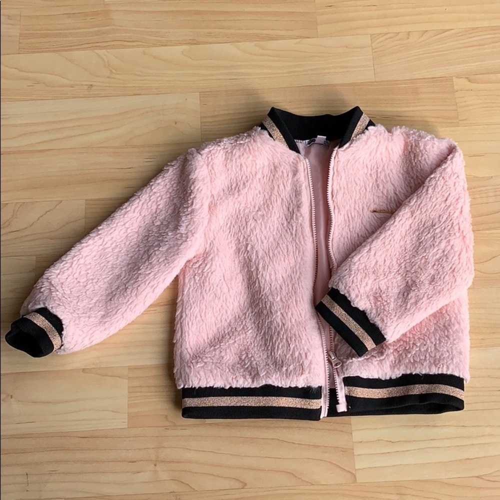 Fuzzy pink jacket with sparkly cuffs